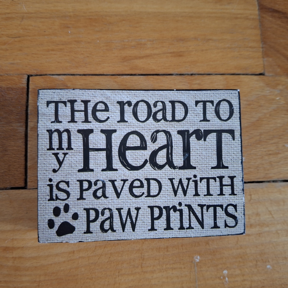 Decorative Sign with Paw Print Design